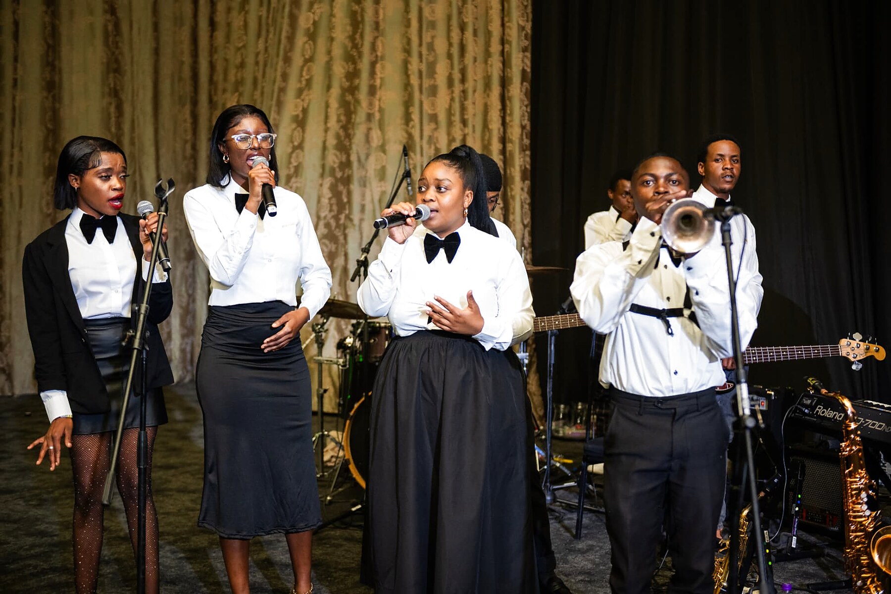 The live band and vocalists performing on stage at the SANAA 2026 gala