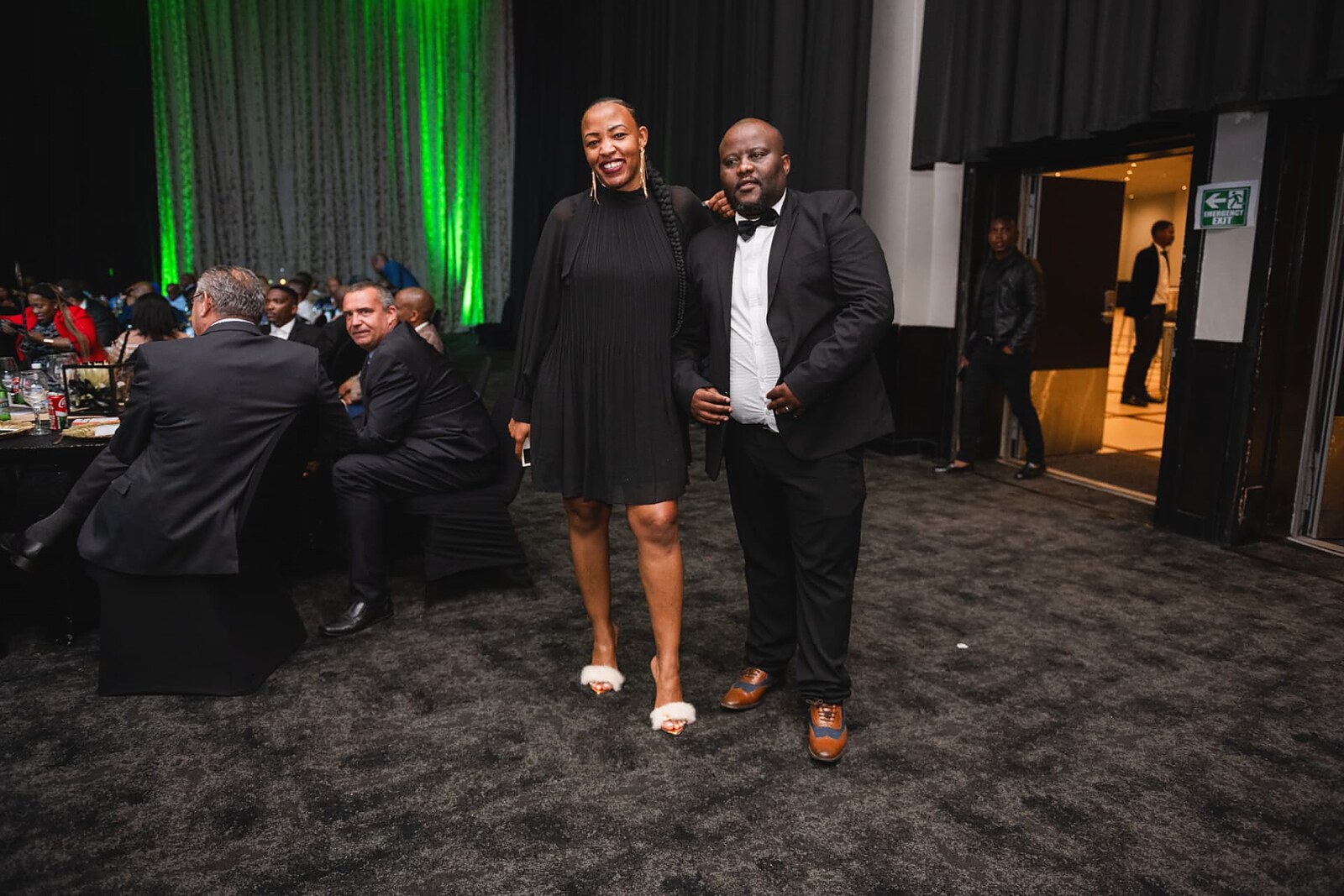 Two guests posing together during the gala evening