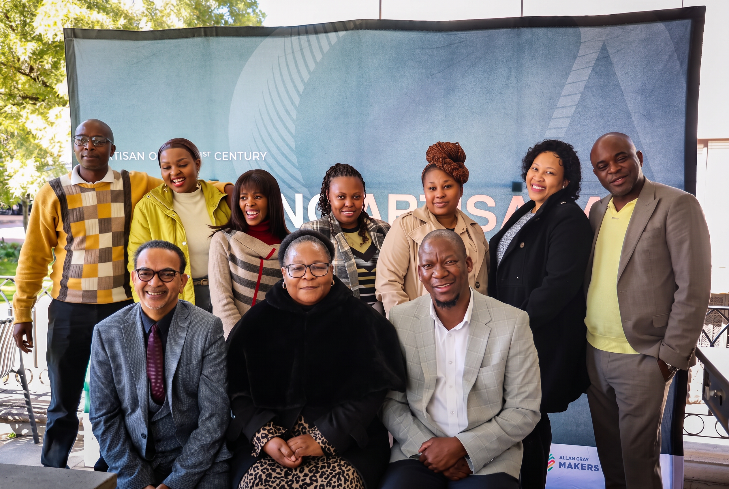 SANAA 2026 committee members grouped in front of the branded awards backdrop