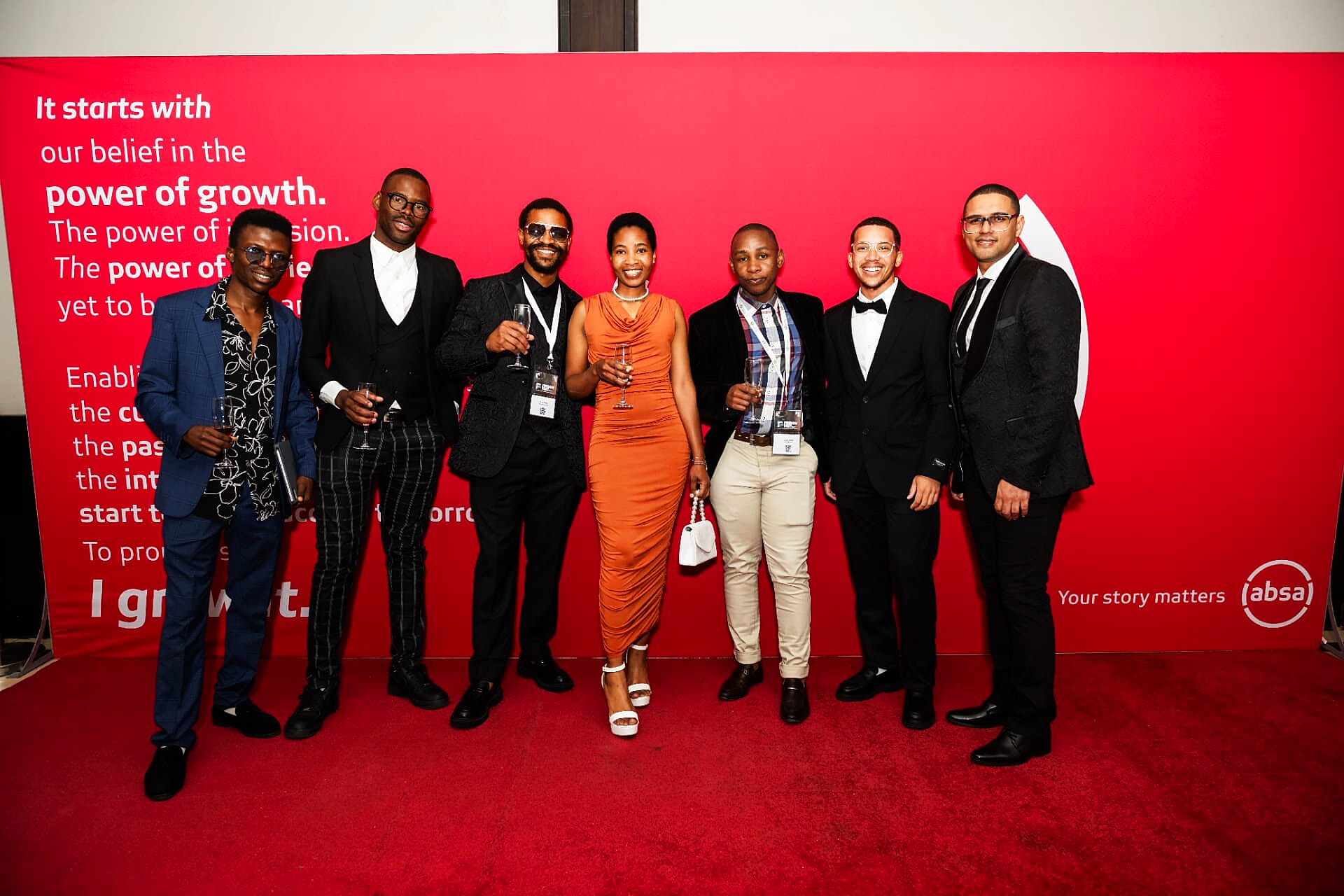 SANAA 2026 finalists and guests on the red carpet in front of the sponsor wall