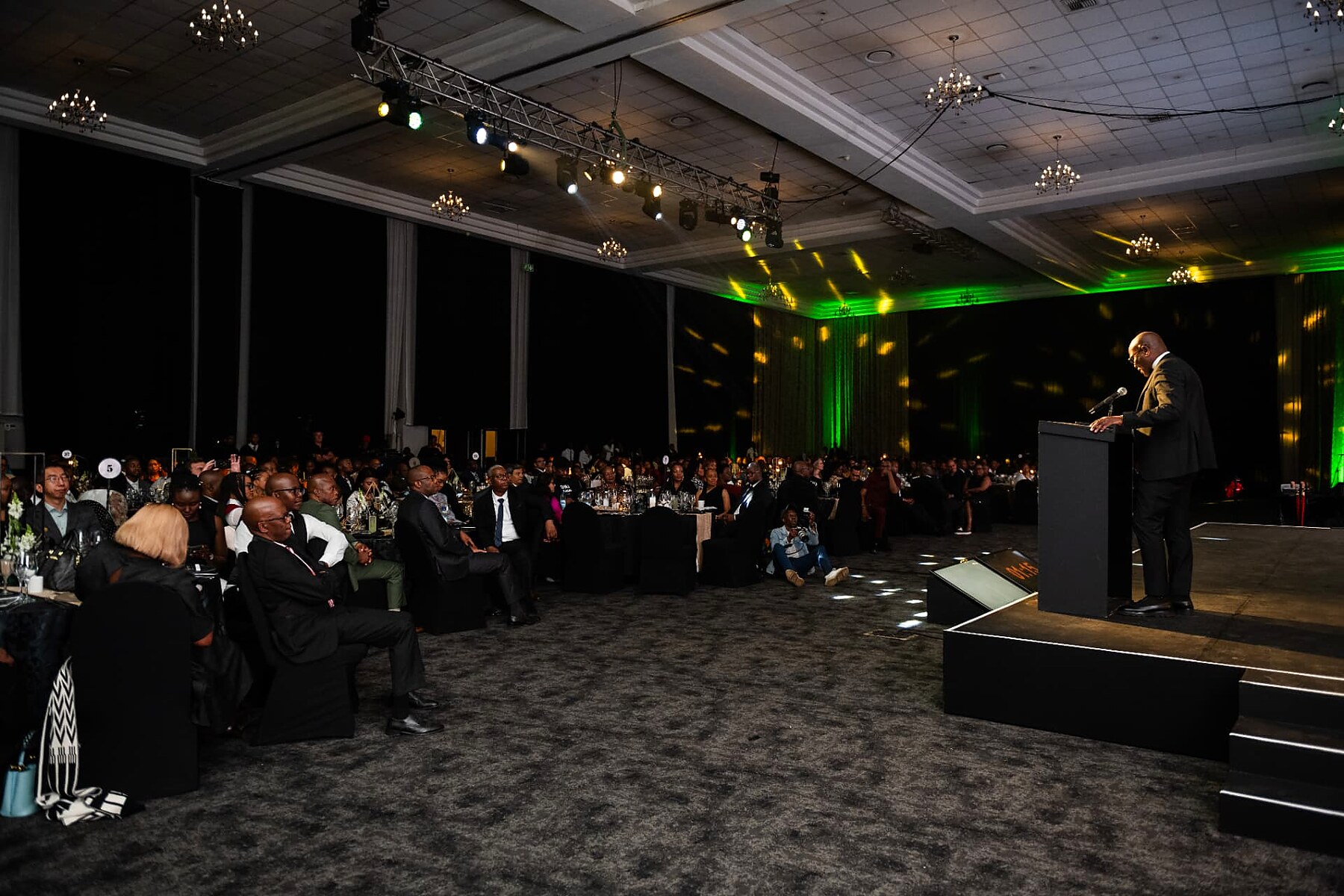 The audience listening to a keynote address at the SANAA 2026 gala