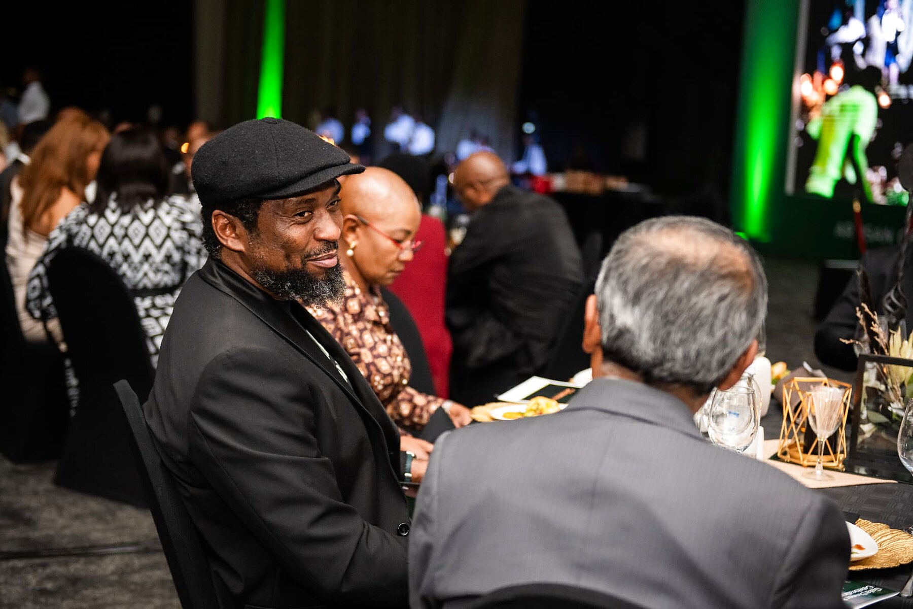 Guests enjoying conversation during the gala dinner service