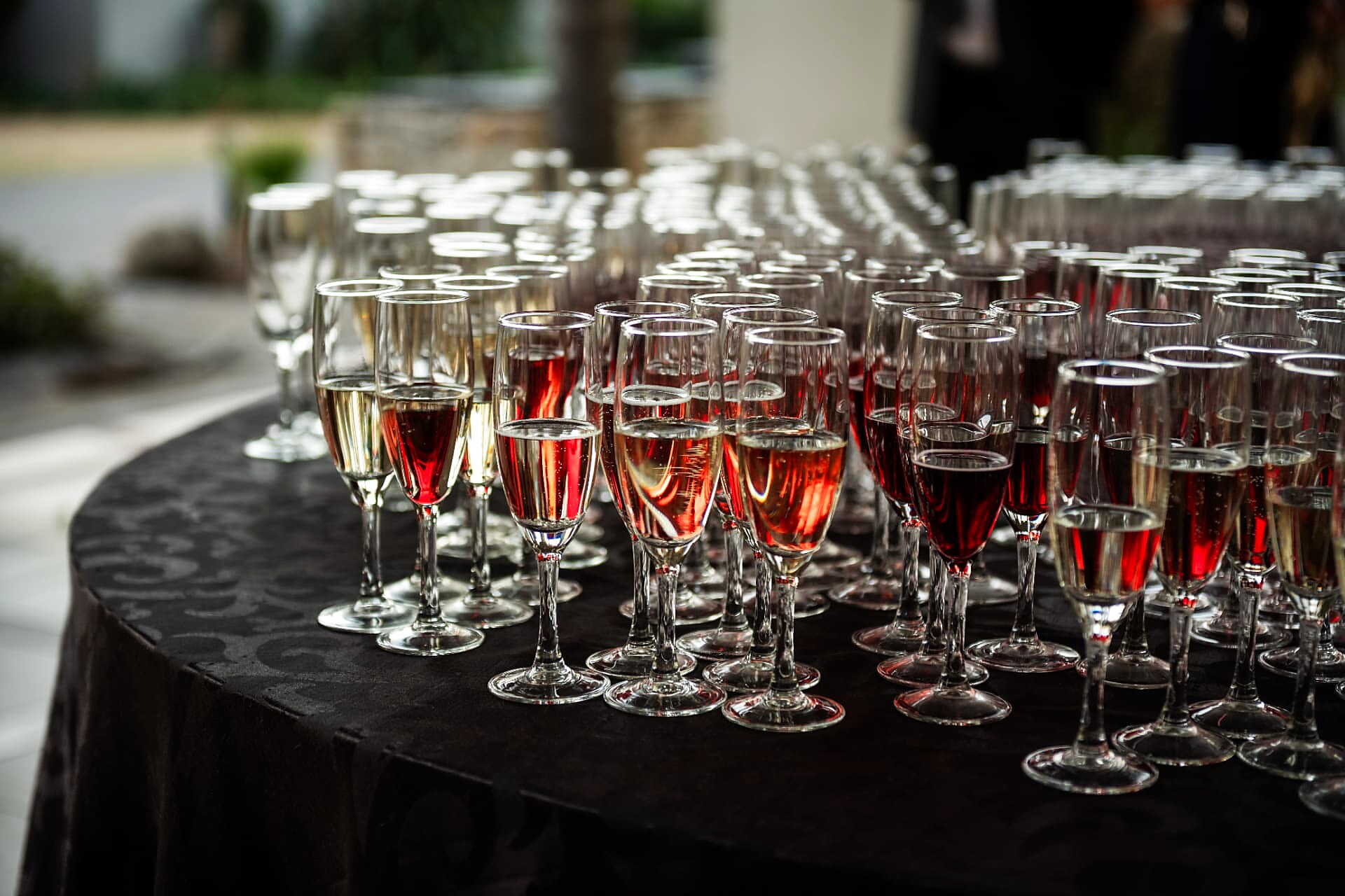 Rows of sparkling wine glasses set out on the welcome table at the SANAA 2026 gala