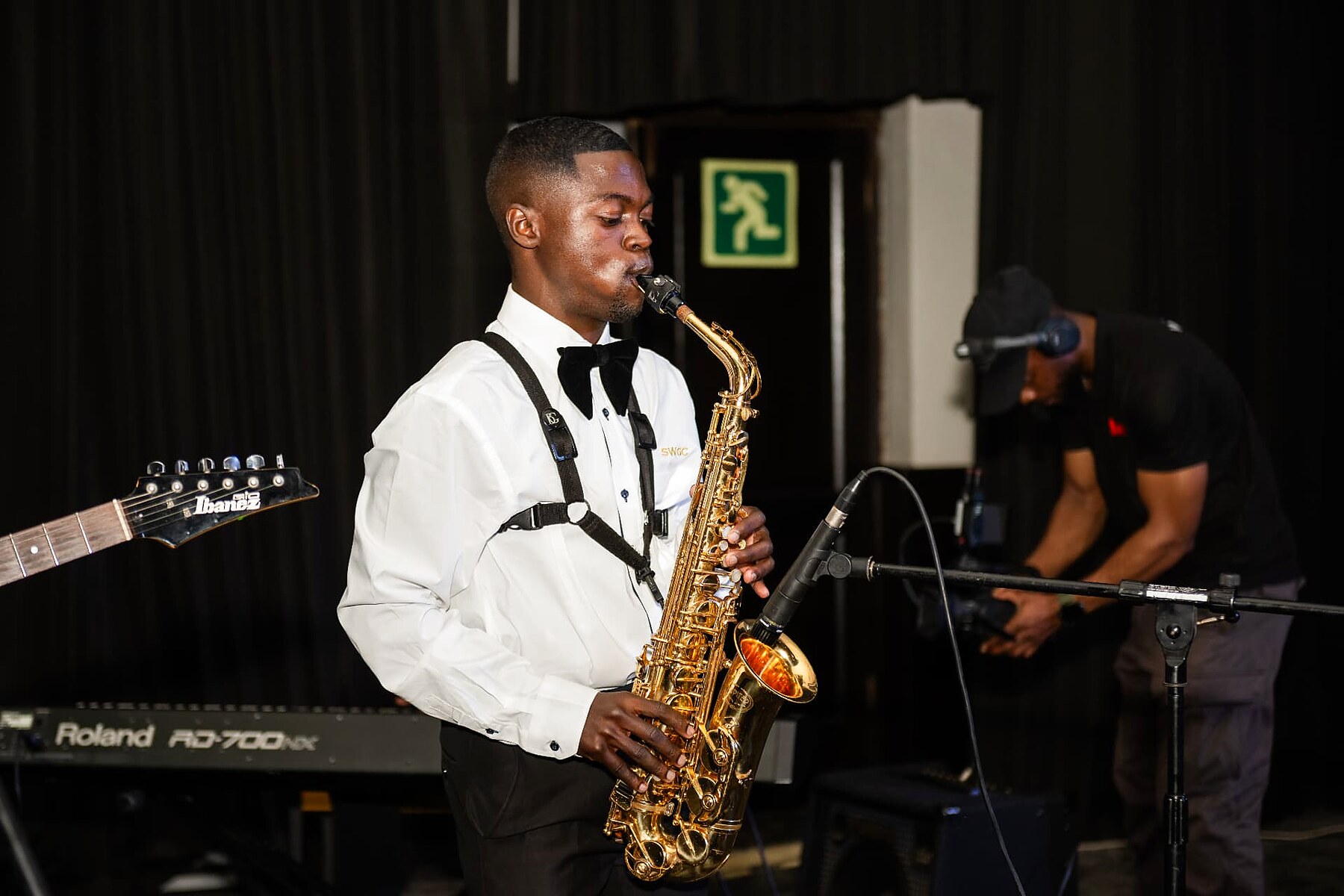 Saxophonist performing on stage at the SANAA 2026 gala
