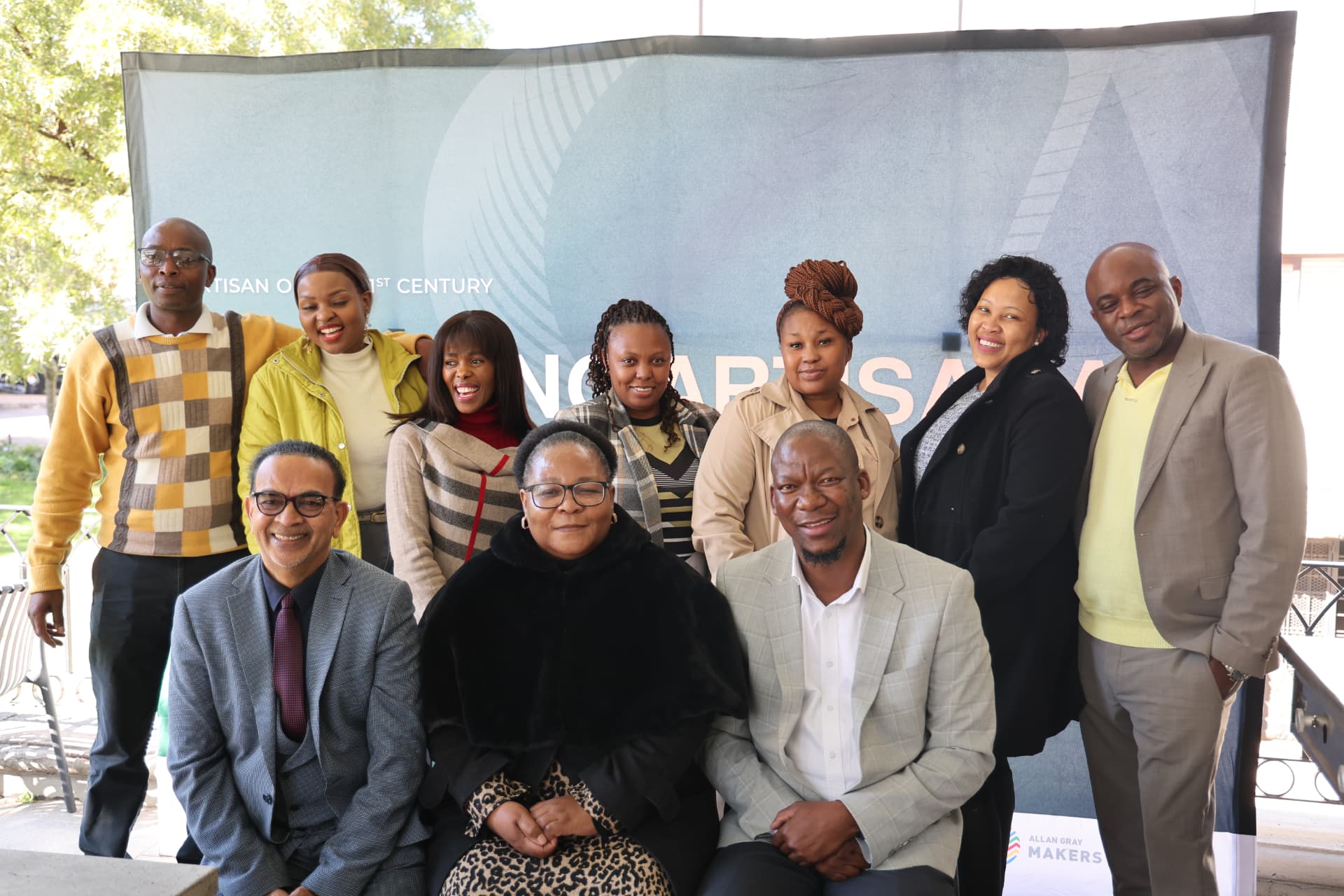 SANAA 2026 committee members grouped in front of the branded awards backdrop
